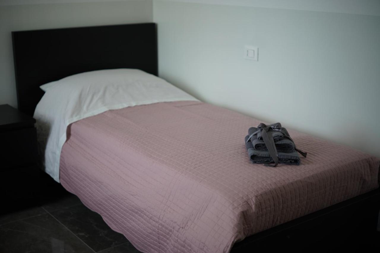 Quarto Individual com Banheiro Compartilhado