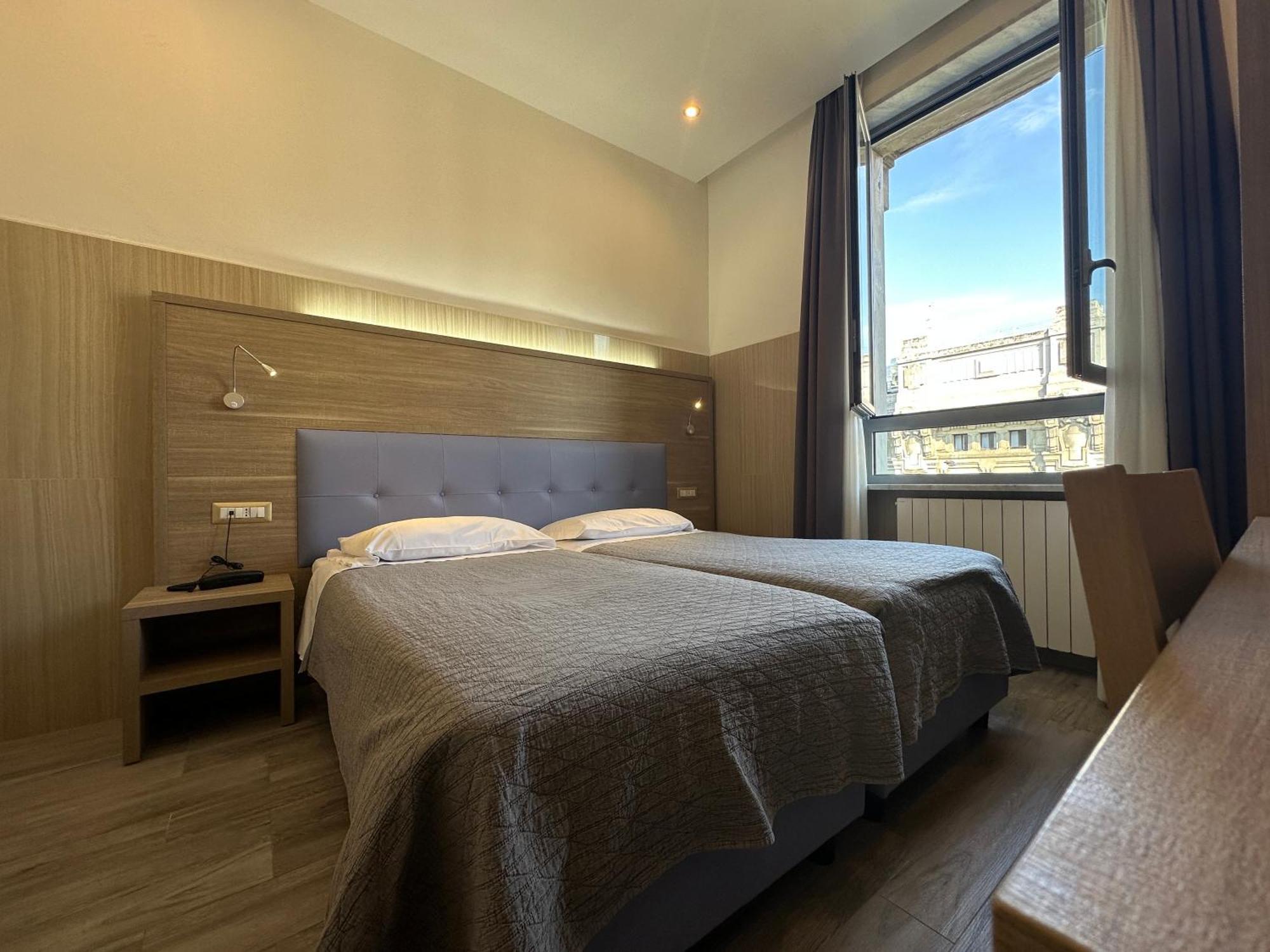 Quarto com 2 Camas de Solteiro