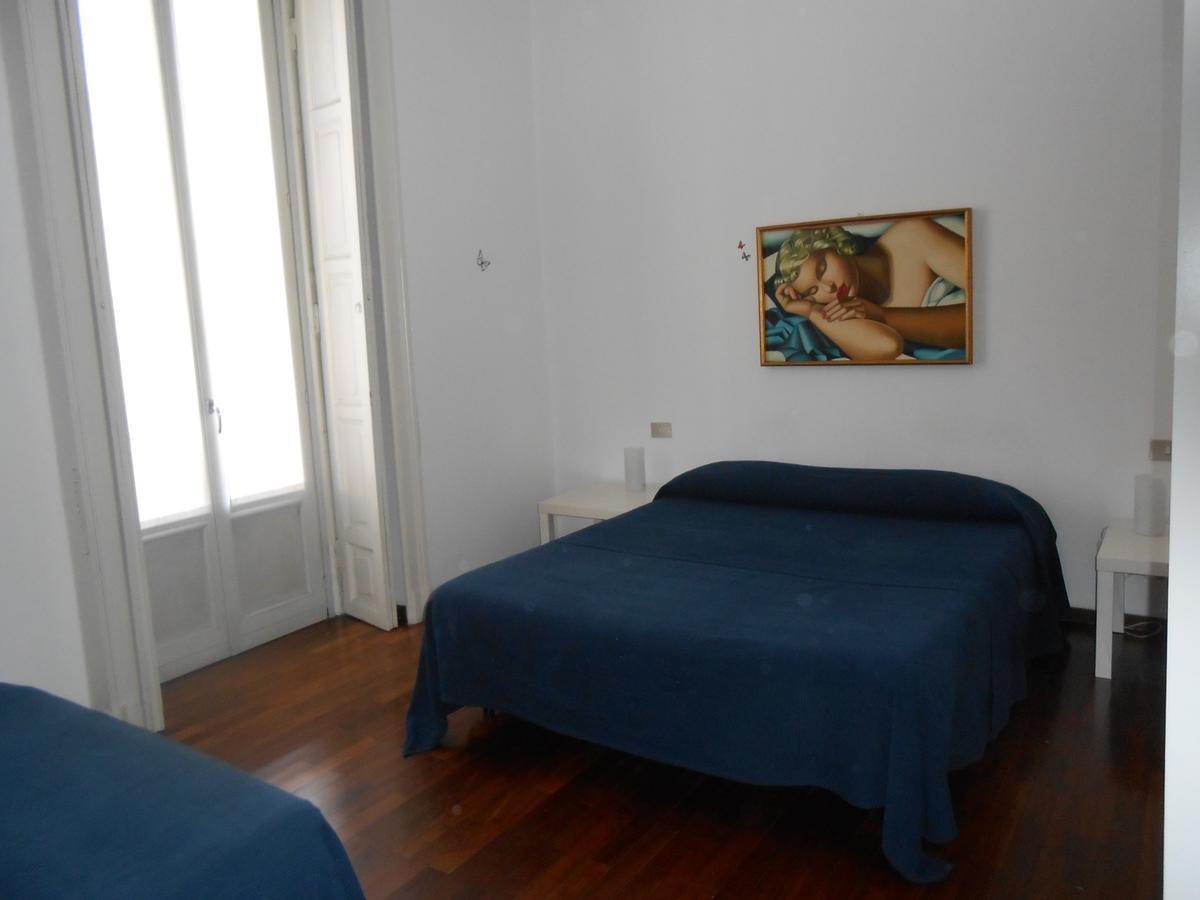 Quarto Triplo Básico com Banheiro Compartilhado